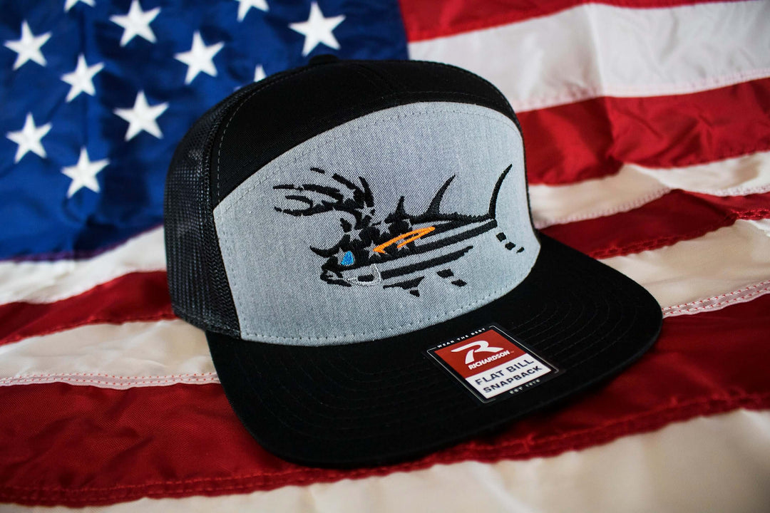 Flexfit hat featuring a fish design on a backdrop of an American flag, perfect for clean, wash, and care tips.
