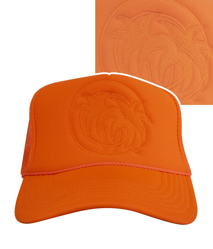 Hot Foam foam trucker hat in bright orange featuring palm tree logo embroidery on the front.