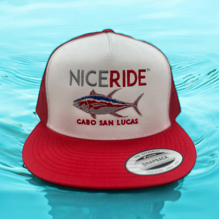 NICERIDE Sorry Charlie Cabo classic snapback trucker hat, stylish fishing cap with red accents on a water background.