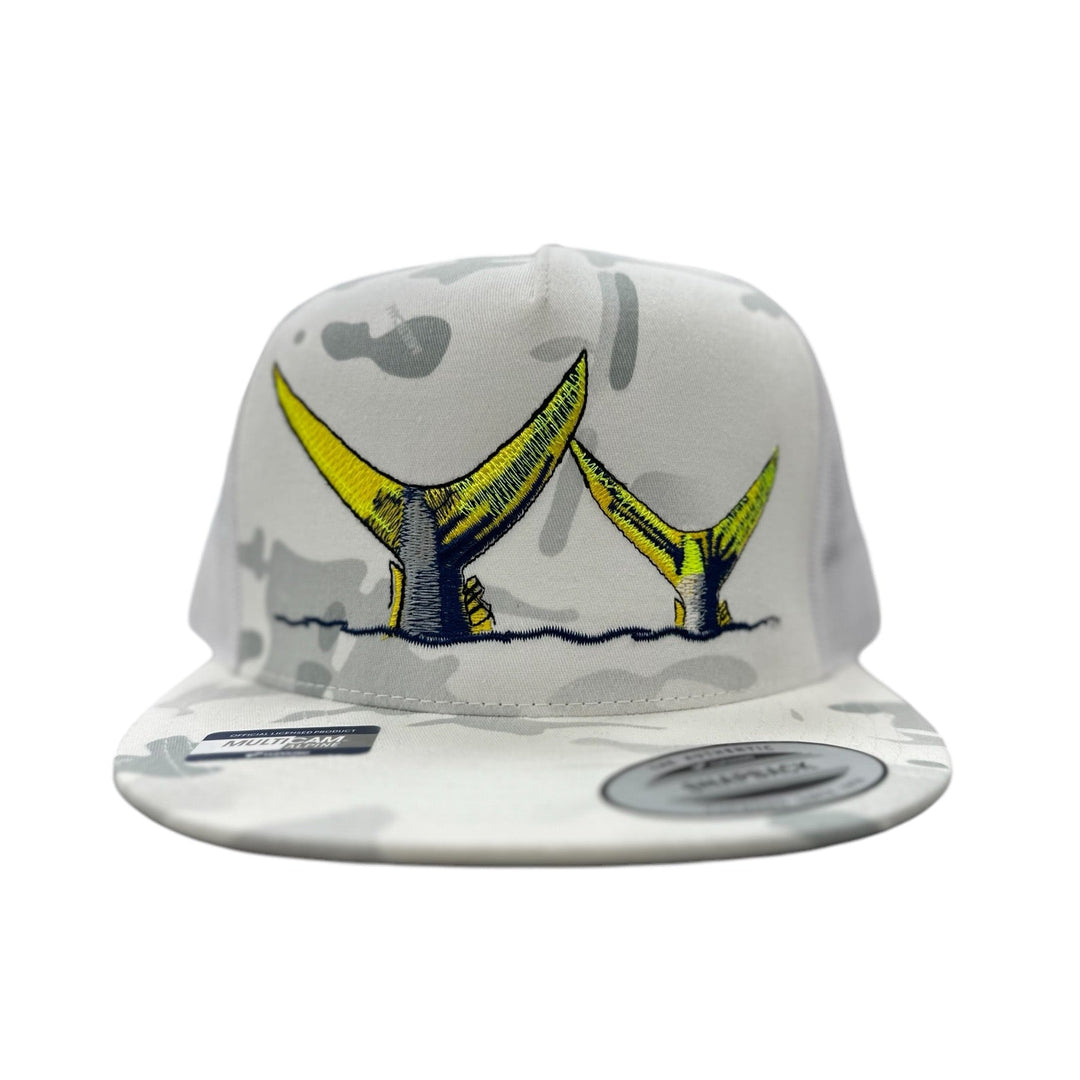 NICERIDE Tall Tails Trucker Hat with embroidered yellow whale tails on a camouflage background.