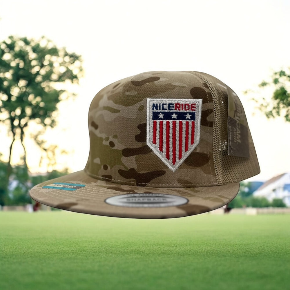 NICERIDE camo snapback trucker hat with embroidered logo, showcasing stylish design in outdoor setting.