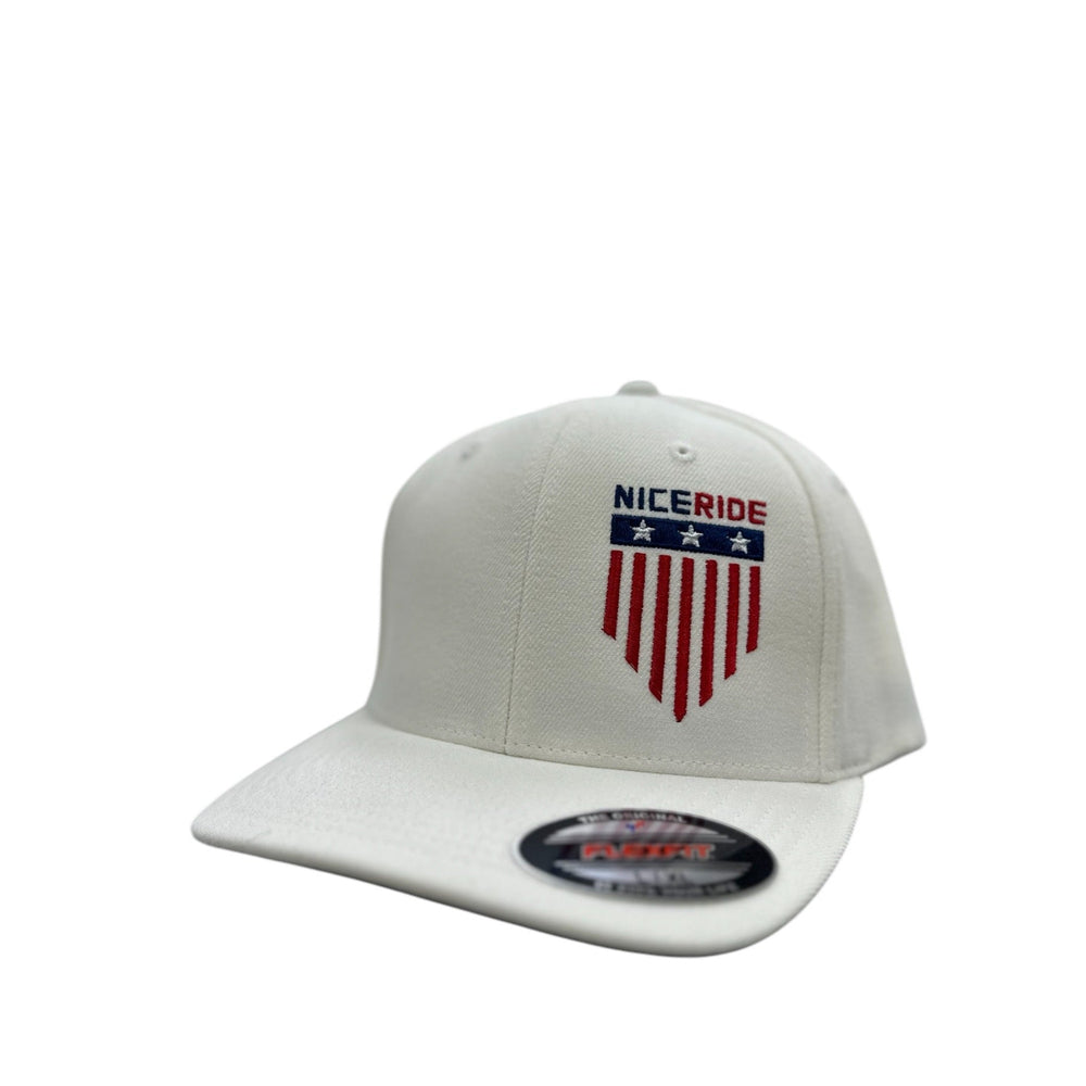NICERIDE white baseball cap with red and blue embroidered logo and stars, showcasing a stylish design for casual wear.