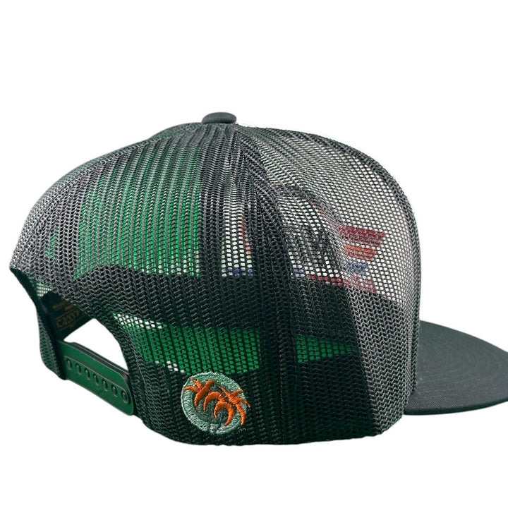 Back view of NICERIDE REV Unisex Trucker Hat showing mesh design and Palm Logo emblem.