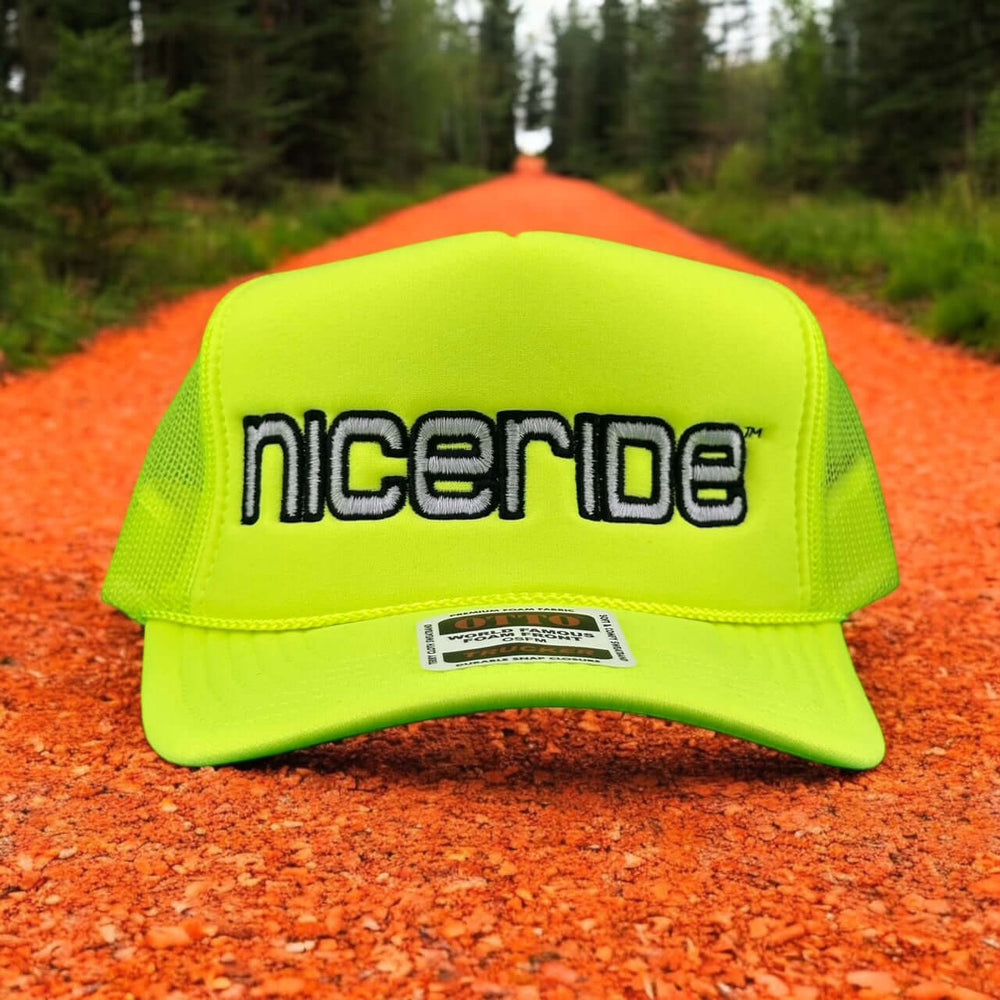 Bold Tower Yellow Foam Trucker Hat by NICERIDE, showcasing the brand logo, perfect stylish accessory for outdoor adventures.