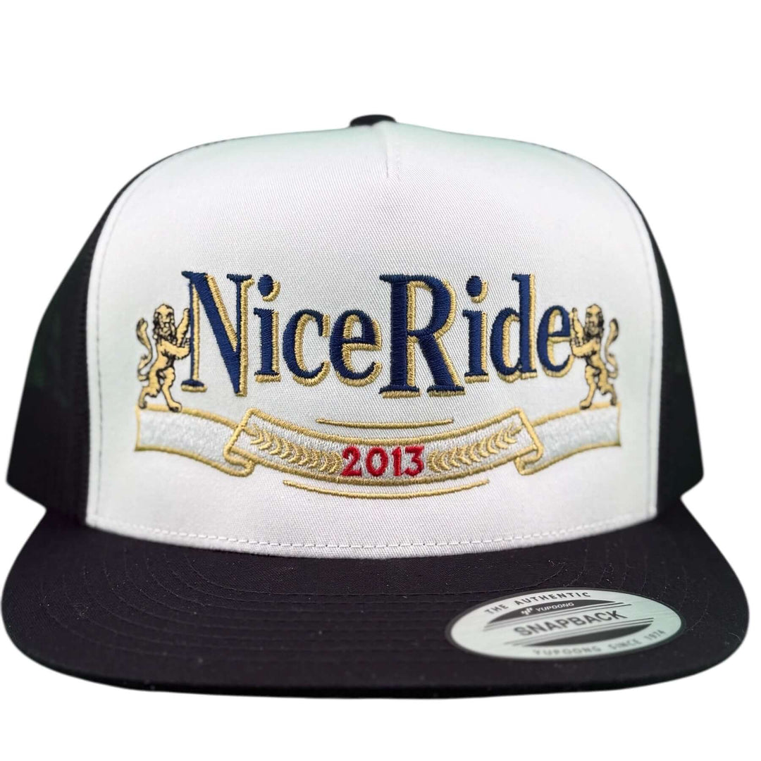 Del Oro unisex adjustable trucker hat with Nice Ride logo and 2013 embroidered design on front.