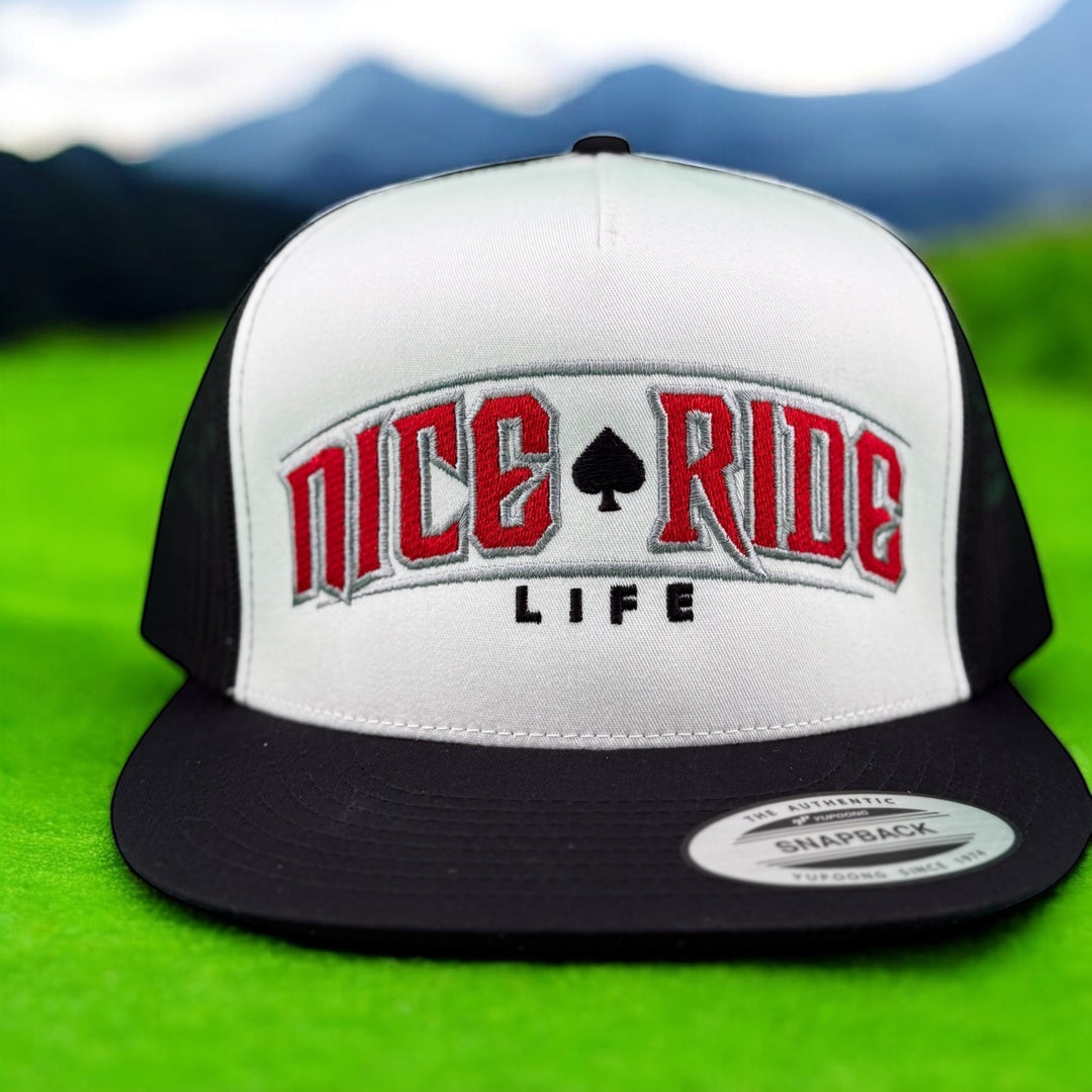 NICERIDE adjustable trucker hat with bold embroidered logo on a green background.
