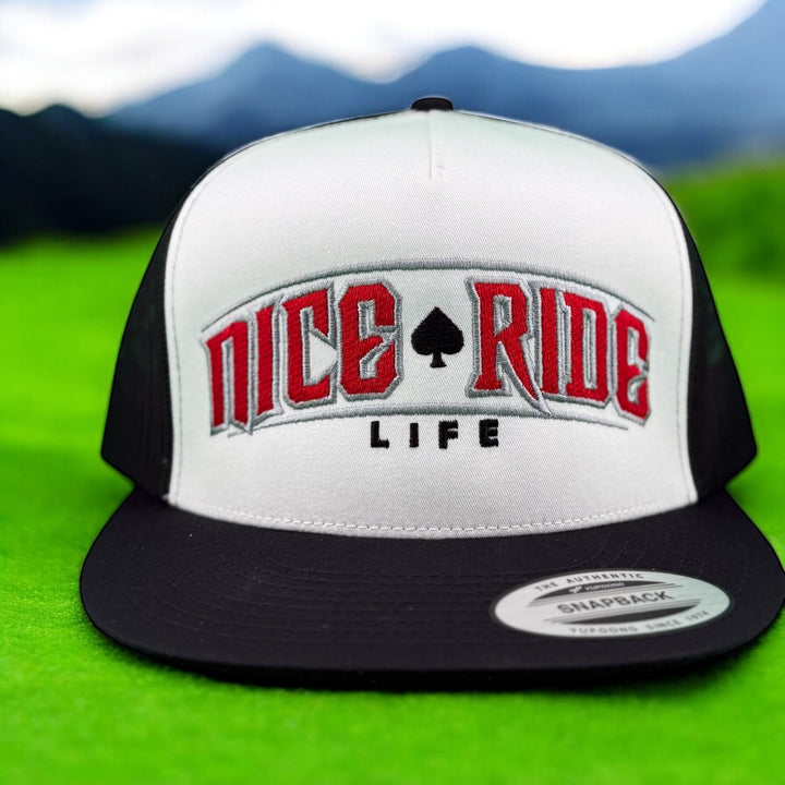 NICERIDE adjustable trucker hat with bold embroidered logo on a green background.
