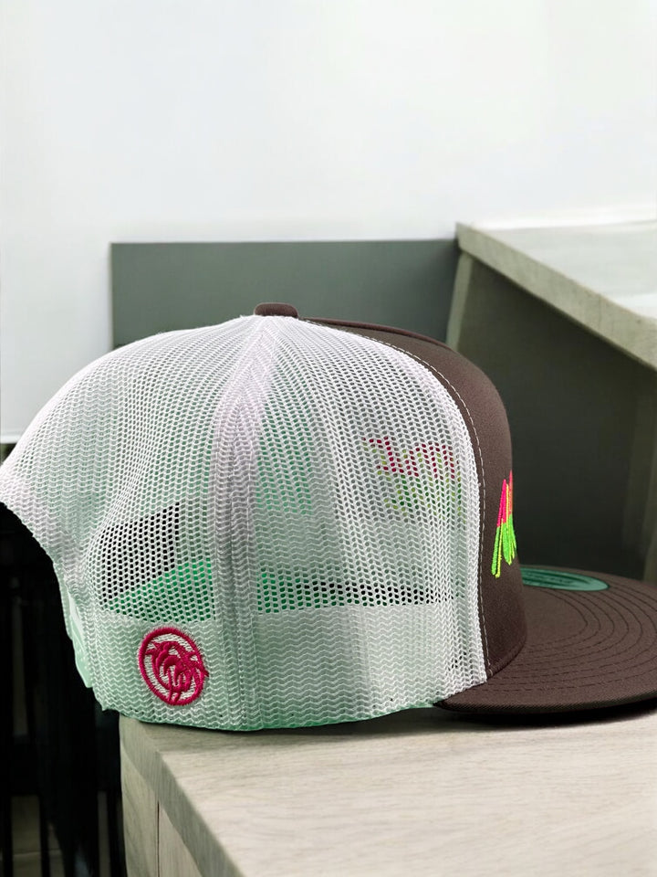 Back view of NICERIDE Slump Buster unisex trucker hat showcasing mesh design and vibrant logo on brown cap.