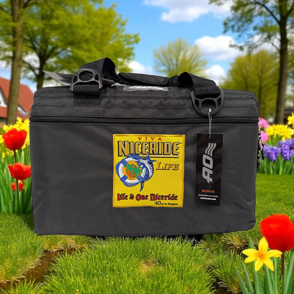 Viva NICERIDE ballistic soft sided AO cooler 36 pack with embroidered design in a garden setting.
