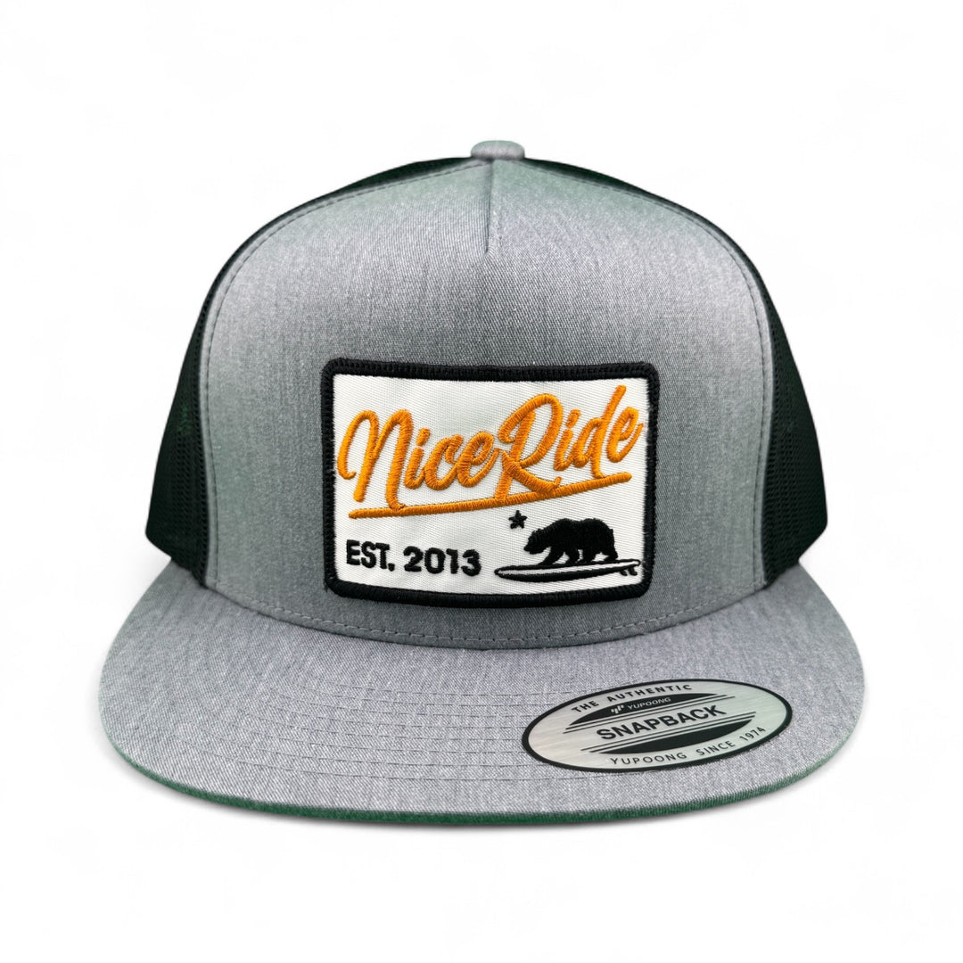 Big Sky unisex snapback trucker hat featuring NiceRide logo and bear design, perfect for outdoor adventures.