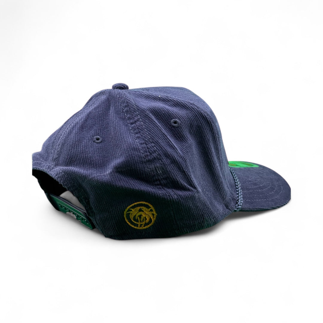 Back view of the Big Sky corduroy snapback baseball cap showcasing navy color and logo detail.