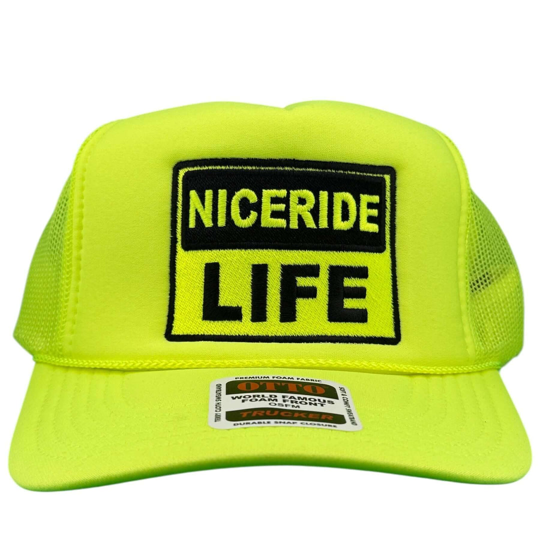 Caution Foam Trucker Hat by NICERIDE in vibrant yellow with bold embroidered logo.