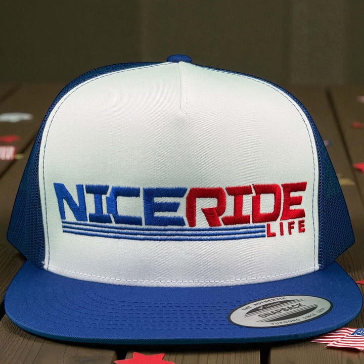 Niceride RedLine adjustable trucker hat with blue mesh and white front panel, showcasing logo and stylish design.