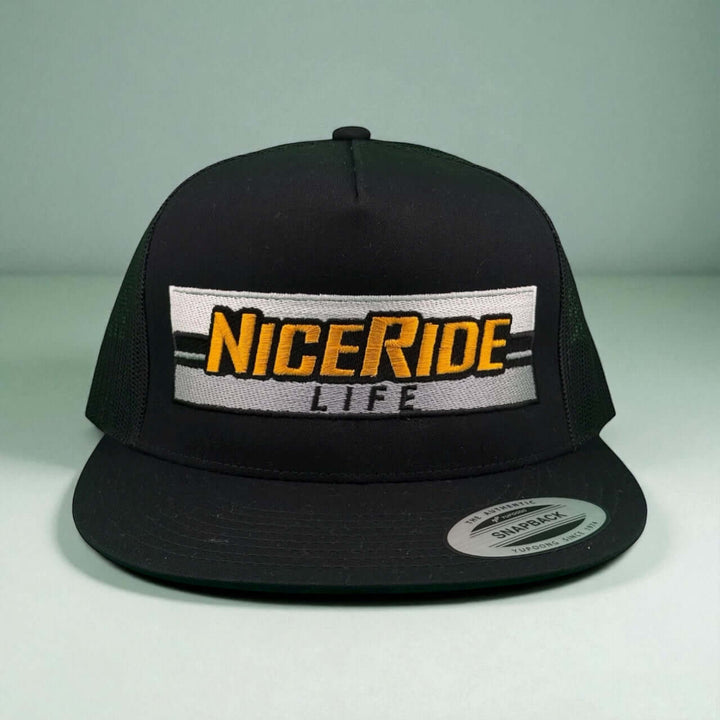 Niceride "MUD" 6006 Unisex Adjustable Trucker Hat in black with embroidered logo for outdoor style.
