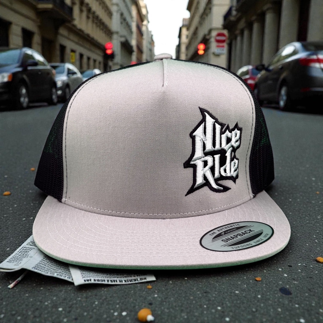 Niceride My Hero 6006 Unisex Adjustable Trucker Hat on a city street with cars in the background.