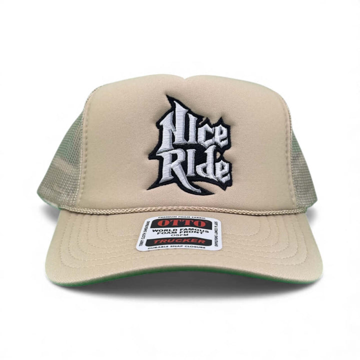 My Hero Otto Foam Unisex Adjustable Trucker Hat with embroidered Nice Ride logo in beige.