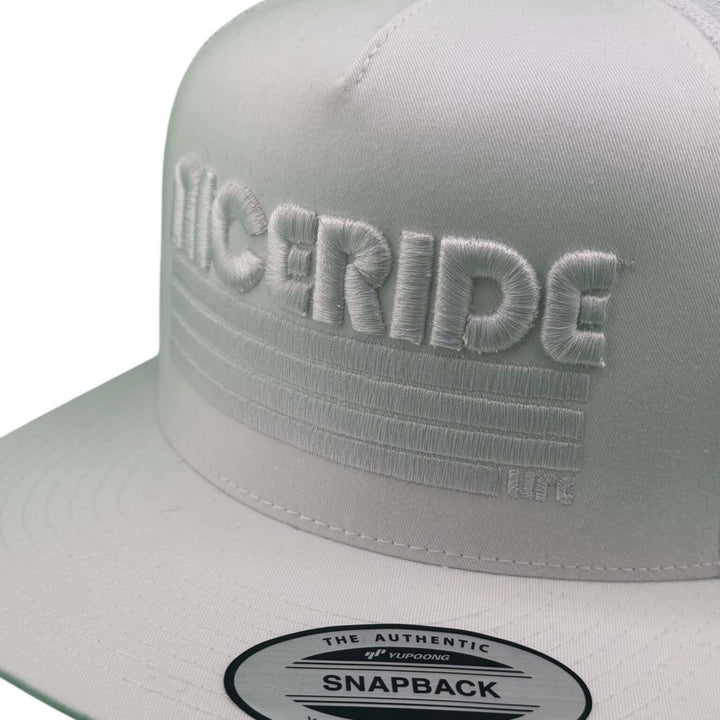 "Trigger" 3D Puff unisex adjustable trucker hat featuring NICERIDE embroidered design in white.