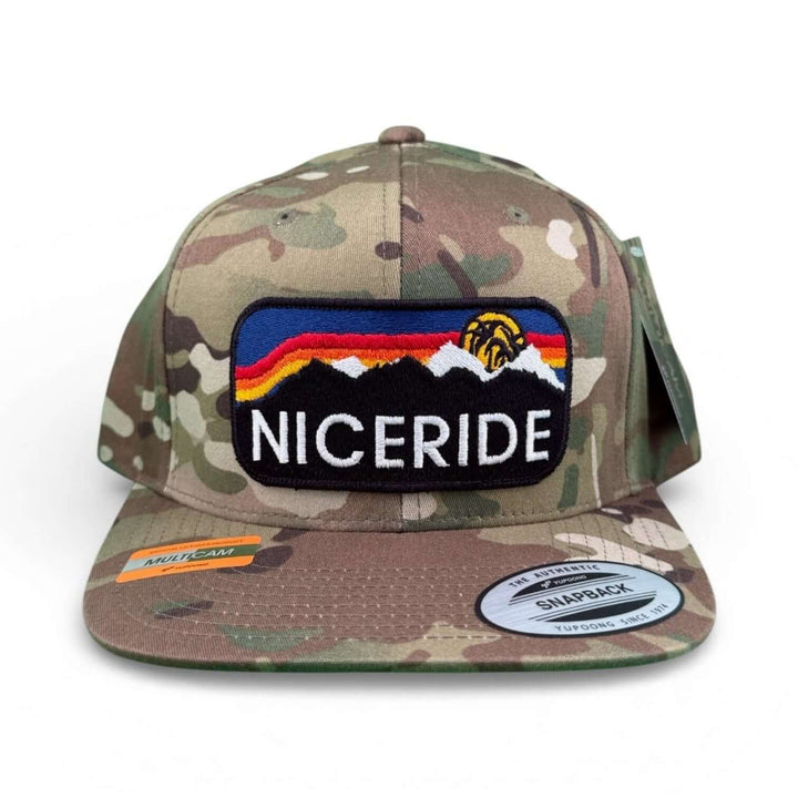 NICERIDE camo trucker hat featuring embroidered logo, unisex adjustable hat for outdoor style.