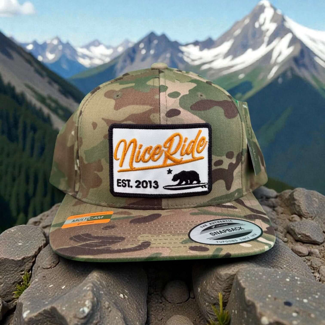 NICERIDE "Big Sky" 6089 unisex adjustable Multicam trucker hat with logo on front panel.