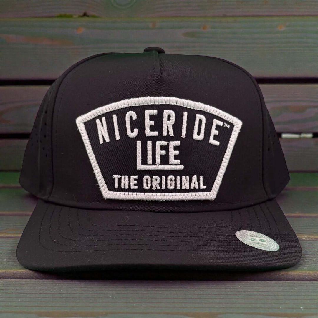 NICERIDE Grinder cap featuring a waterproof A-Frame design and laser-cut mesh back, perfect for performance golf.