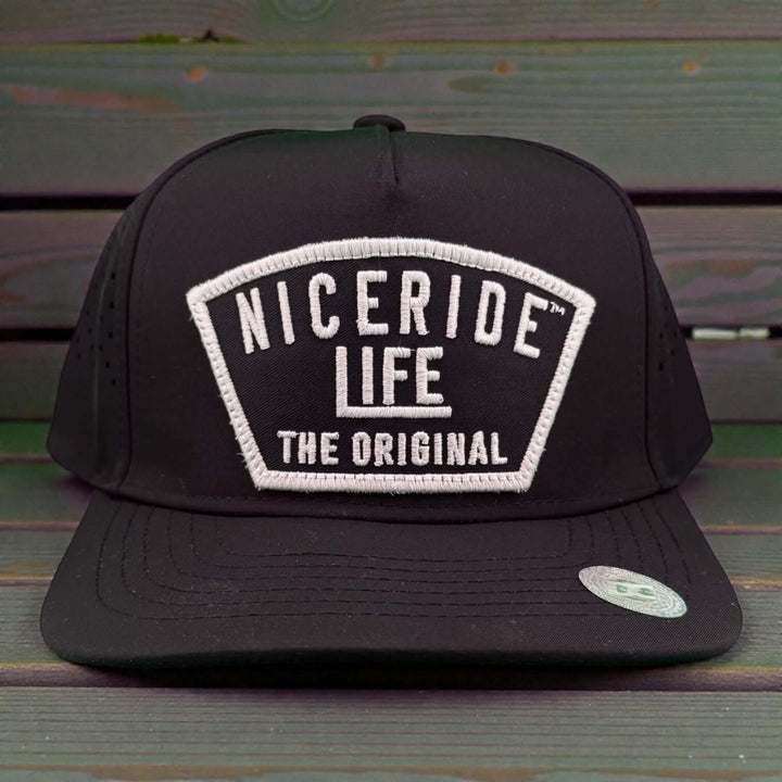 NICERIDE Grinder cap featuring a waterproof A-Frame design and laser-cut mesh back, perfect for performance golf.