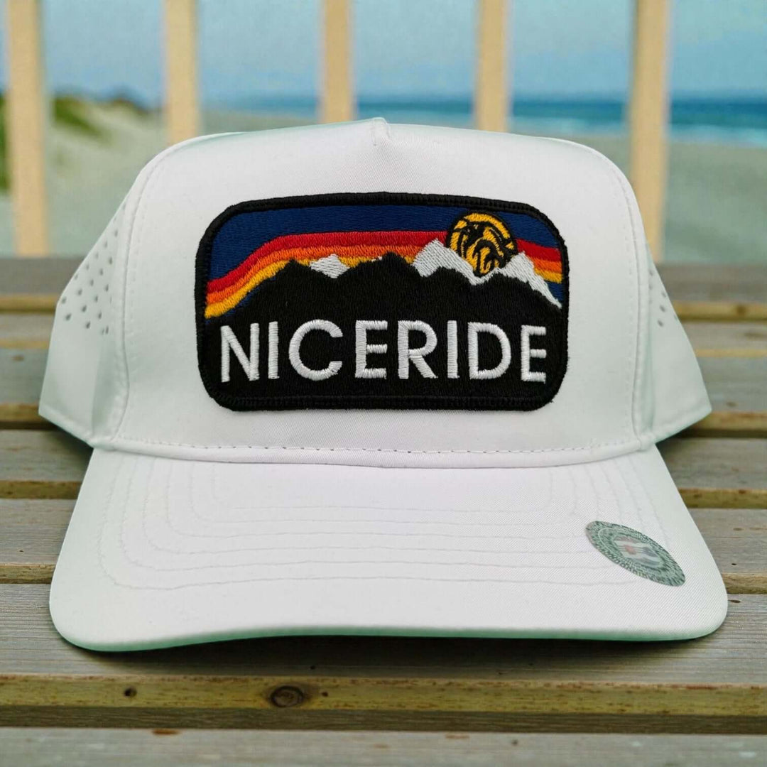 NICERIDE Glacier embroidered cap featuring a laser-cut mesh back, perfect for performance and style.