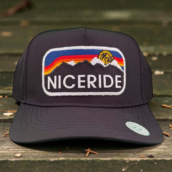 NICERIDE "Glacier" Embroidered cap featuring mountain logo, colorful design, and performance-focused style for golf.