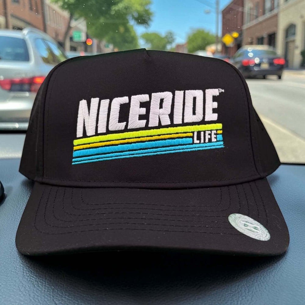 NICERIDE embroidered cap featuring bright colors and logo, perfect for performance and style.