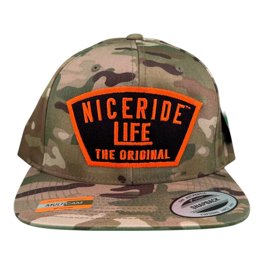 NICERIDE "GRINDER" unisex adjustable Multicam trucker hat, featuring embroidered logo on structured front panel.