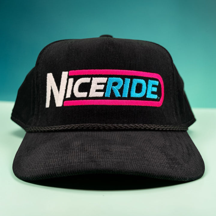 THE TUBE Corduroy cap featuring a colorful NiceRide logo, perfect for outdoor adventures and street style.