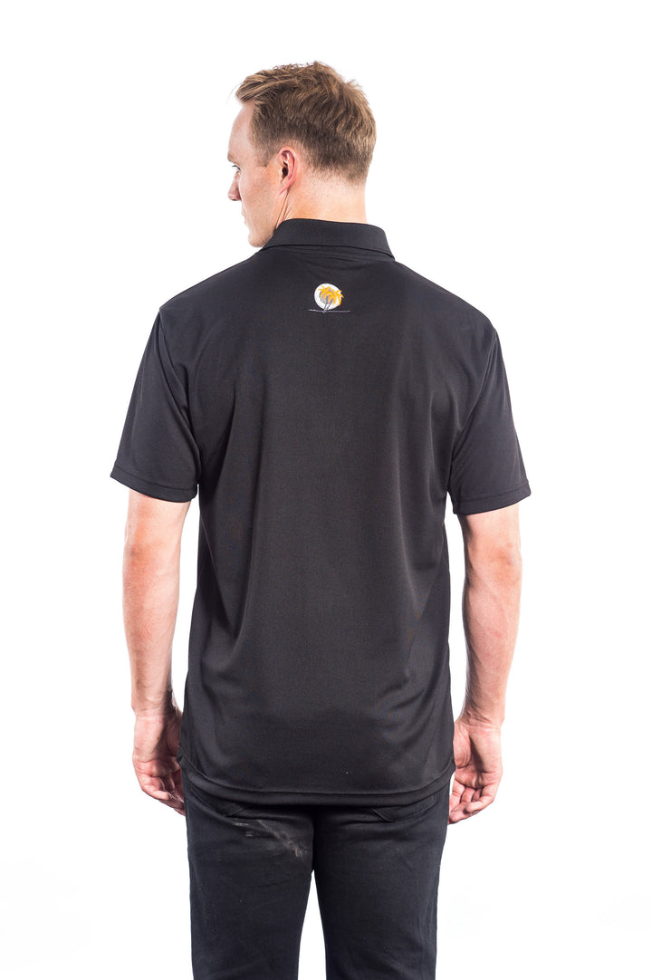 Back view of a man wearing a black golf shirt featuring an embroidered palm logo, perfect for various activities.