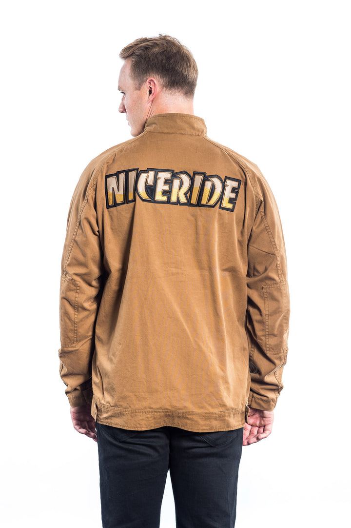 Back view of Big Country jacket in brown with NICERIDE logo embroidered on the back.