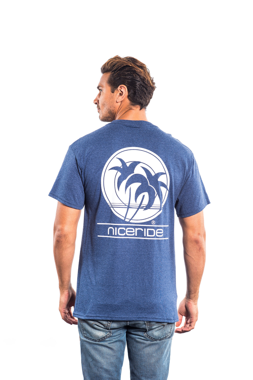 Man wearing Sunset Strip Hanes Men's Comfort Blend Short Sleeve T-Shirt with palm tree design on back.
