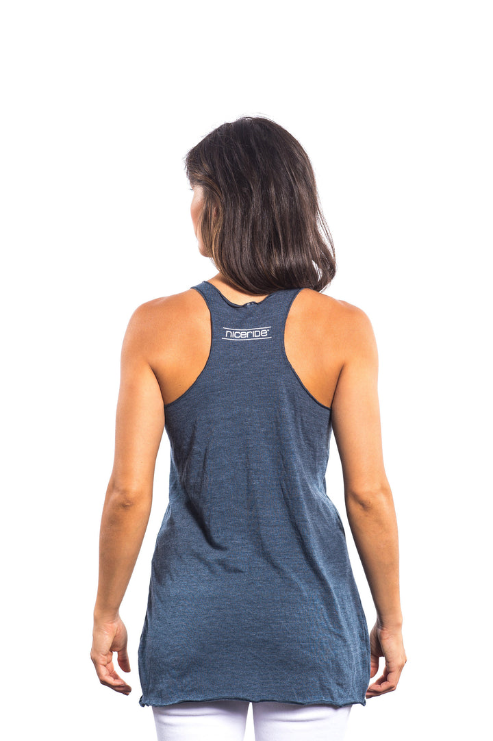 Back view of a woman wearing a NICERIDE Matters blue vintage tank top shirt with racerback design.