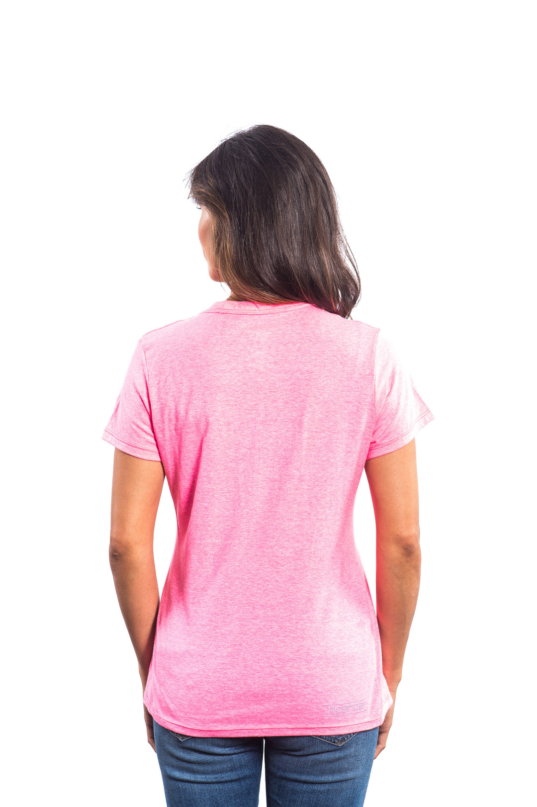 Back view of a woman wearing a pink Raceday Beaches V-Neck shirt, showcasing the comfortable fit and soft fabric.