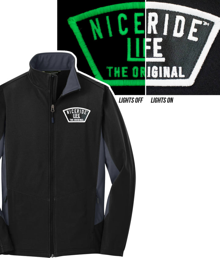 Evening Glow Soft Shell Jacket featuring NICERIDE logo in daylight and glow-in-the-dark under black light.