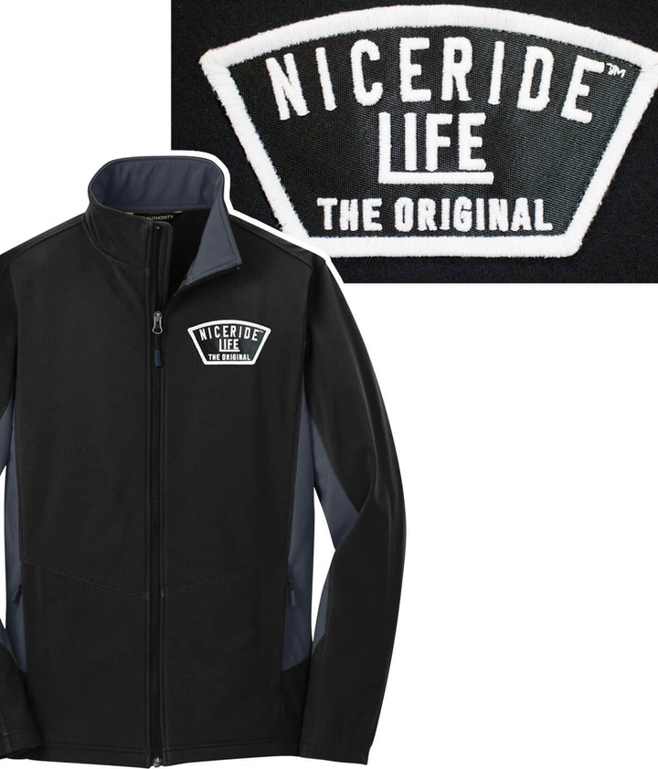 Grinder Evening Glow soft shell jacket featuring NICERIDE logo and glow in the dark thread patch.