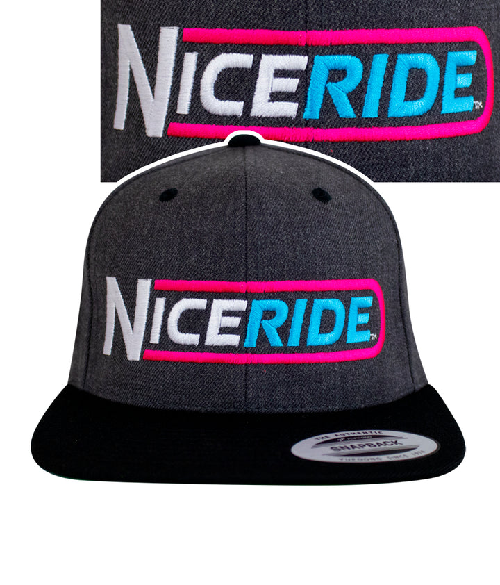 NICERIDE The Tube flatbill snapback hat with bold embroidery on a dark grey background.