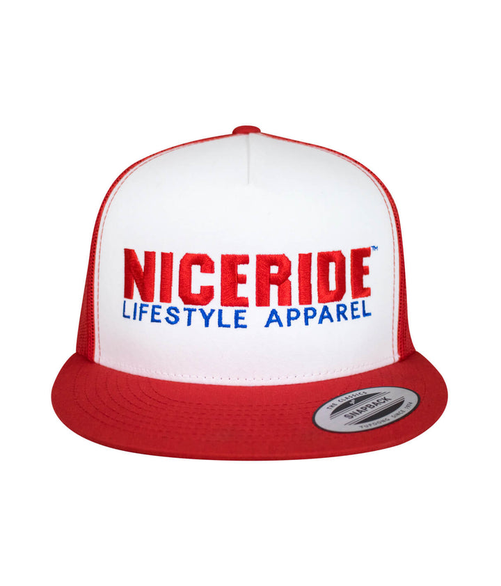Podium Trucker Baseball Hat featuring NICERIDE logo in red and blue embroidery on a classic snapback design.