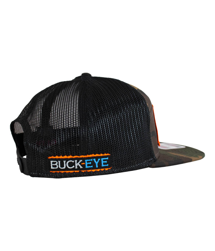 Back view of the Buck-Eye Patch OTTO unisex 7 panel trucker hat featuring a black mesh design and embroidered logo.