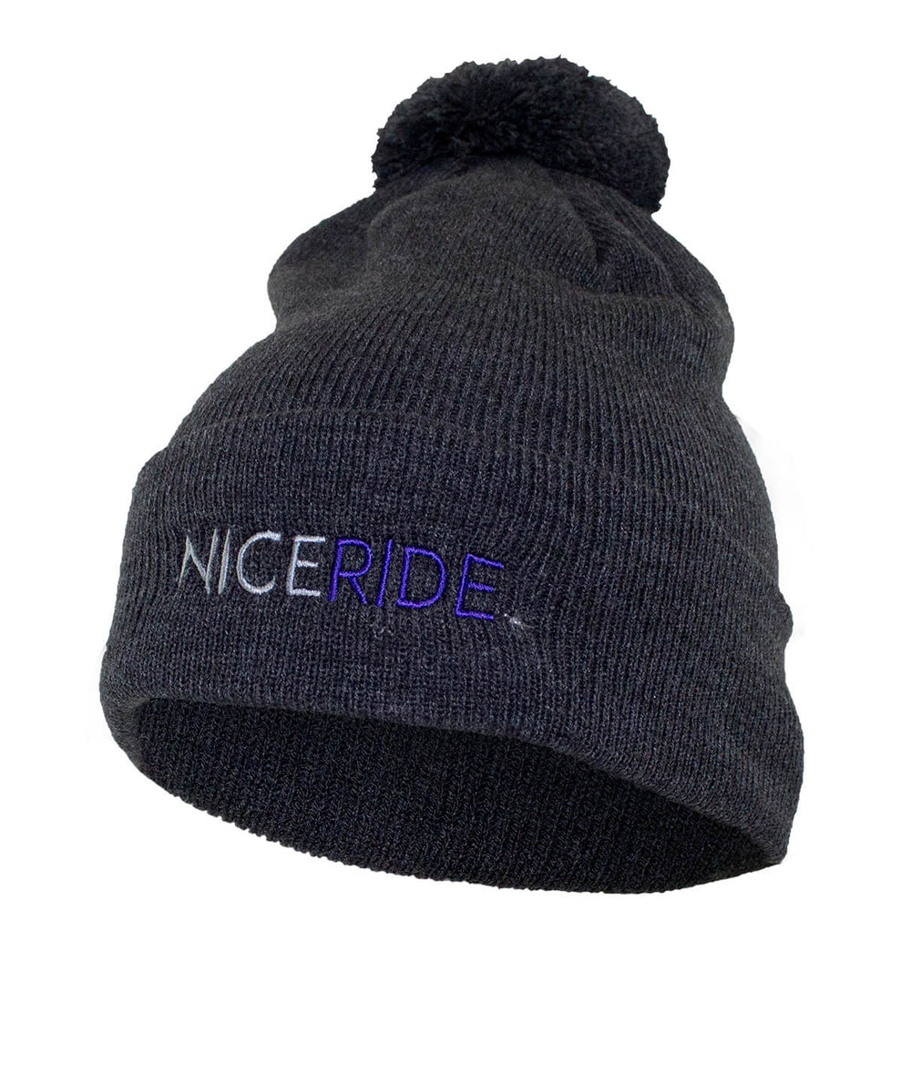 NICERIDE puff beanie in soft charcoal grey with pom pom and embroidered logo, perfect beanie for winter wear.