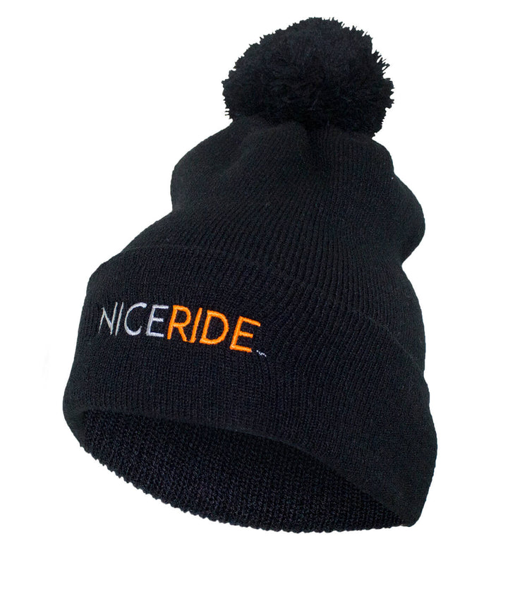 NICERIDE Puff Beanie in soft charcoal grey with puff and embroidered logo, perfect winter accessory.