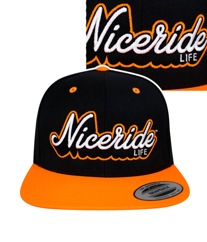 Half Pipe Flatbill Snapback Hat featuring NICERIDE Life design in black and orange.
