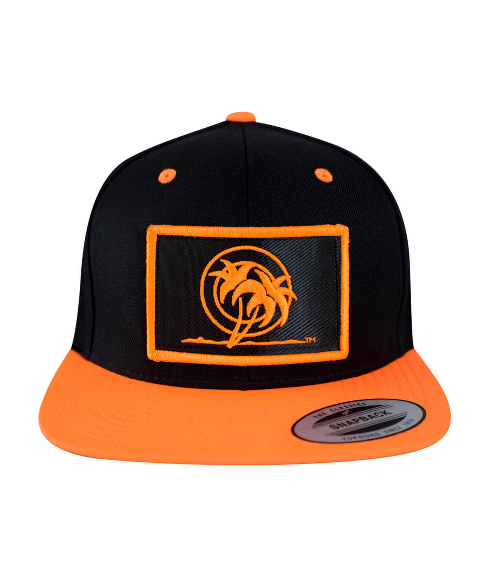 Urban Fever snapback hat featuring a black and orange design with a palm patch embroidered on the front.