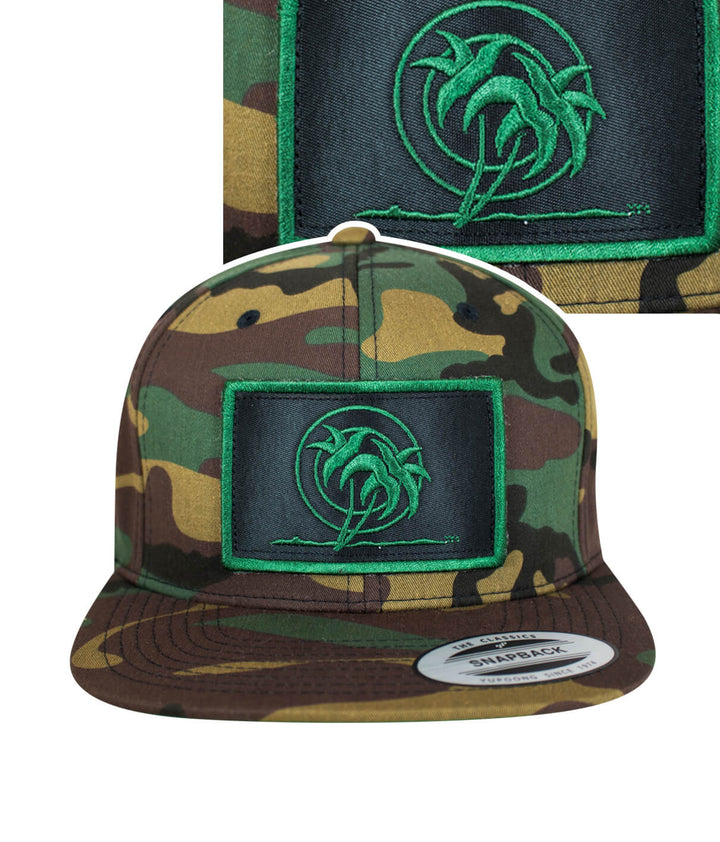 Jungle Fever snapback hat featuring a blacked out palm patch in green on a camouflage background.