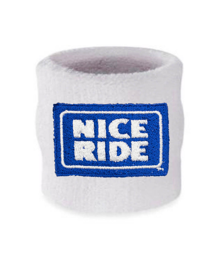 White wristband with NICERIDE logo designed for athletics and stylish comfort.