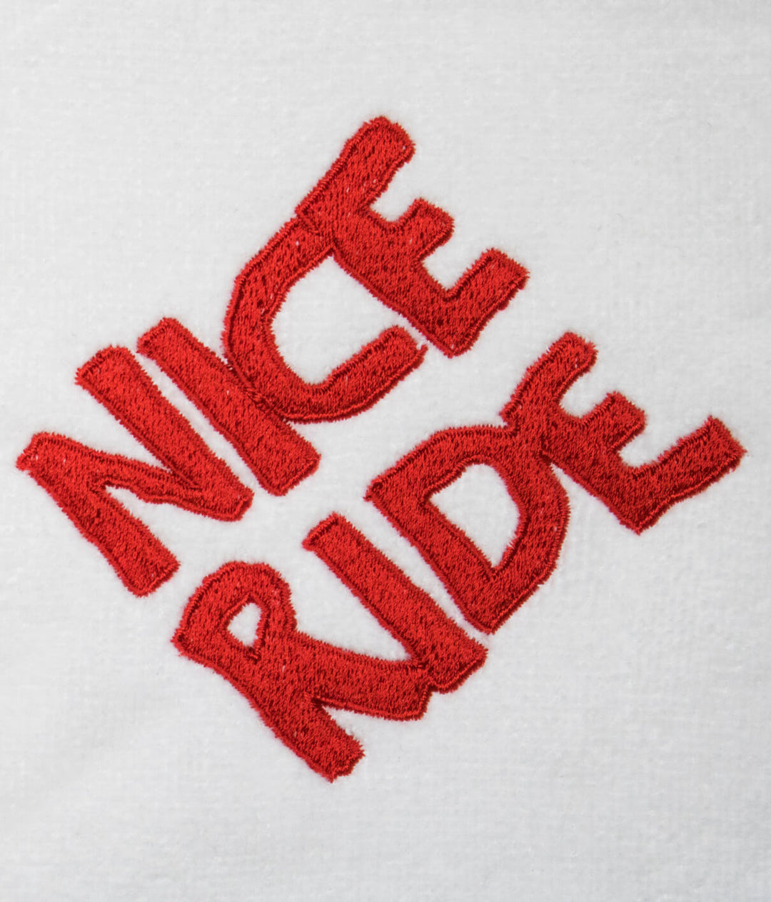 CR Ride golf towel featuring bold red NICERIDE logo on soft cotton fabric.