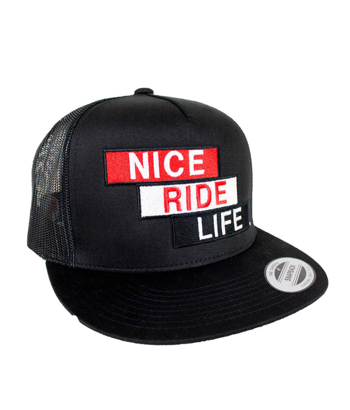 Stepping Up trucker hat with embroidered NICE RIDE LIFE design, adjustable snapback style, black and red colors.
