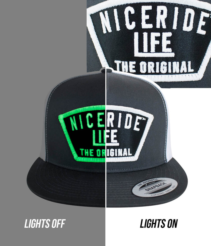 Grinder Trucker Hat showing NICERIDE Life logo, lights off and lights on, classic snapback design.