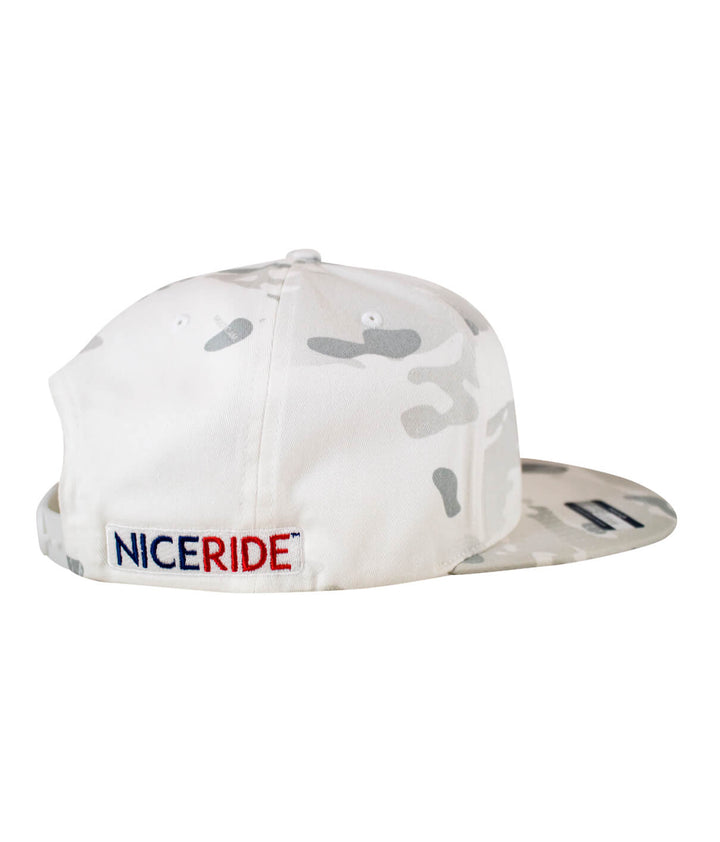 Back view of NICERIDE Spirit of 76 flatbill snapback hat showcasing camo design and embroidered logo.